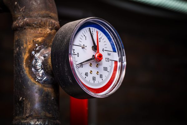 Pipelines with pressure gauge water pressure, Central heating system close-up
